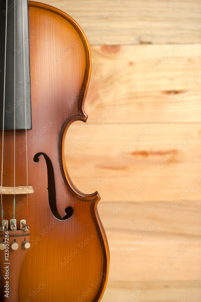 Violin on wooden background