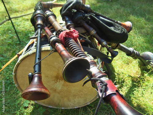 Fotografia, Obraz The composition of musical instruments - bagpipes lying on a drum