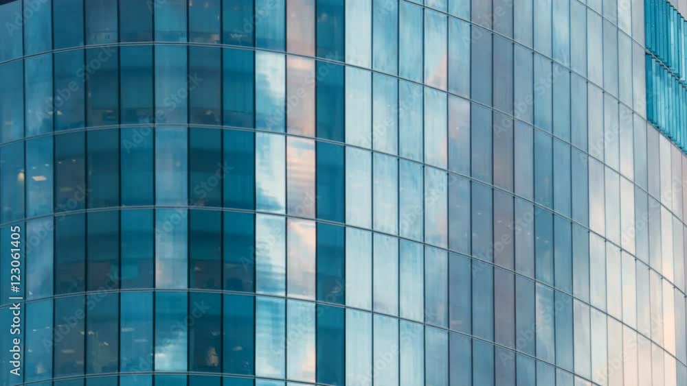 Beautiful time lapse of the cloudy sky reflected in the Windows of a skyscraper Beautiful time lapse of the cloudy sky reflected in the Windows of a skyscraper