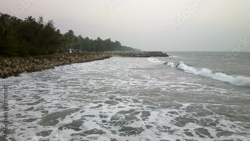 Protection of shores of Indian ocean (Bay of Bengal) from water erosion (bank cutting): breakwaters, granite bank and ocean swell
 photo