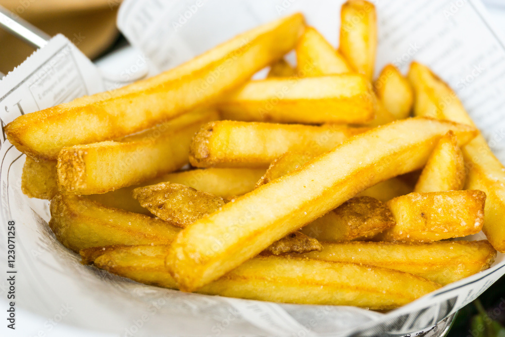 Golden French fries potatoes ready to be eaten Golden French fries potatoes ready to be eaten
