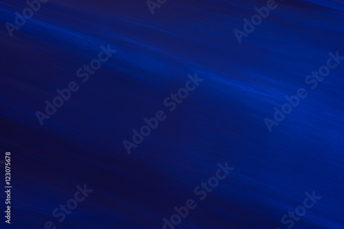 De-focused abstract dark blue navy sea ocean water wavy backgrou photo