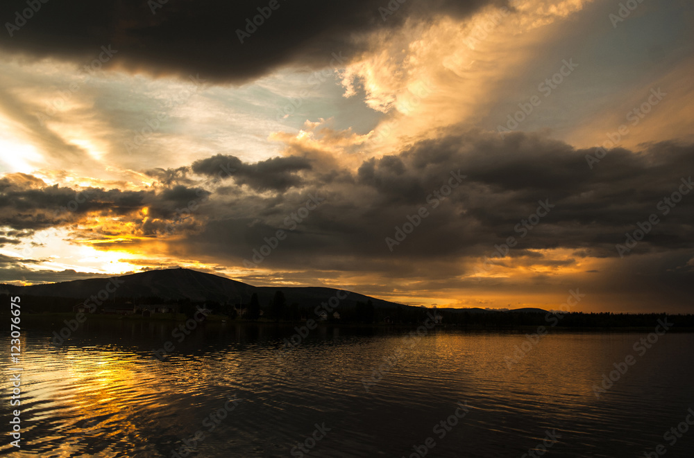 Fototapeta premium dramatic sunset on the lake
