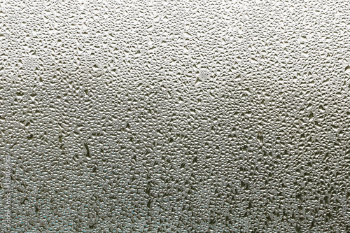 Condensation mirror, Water drops from home condensation on a window.