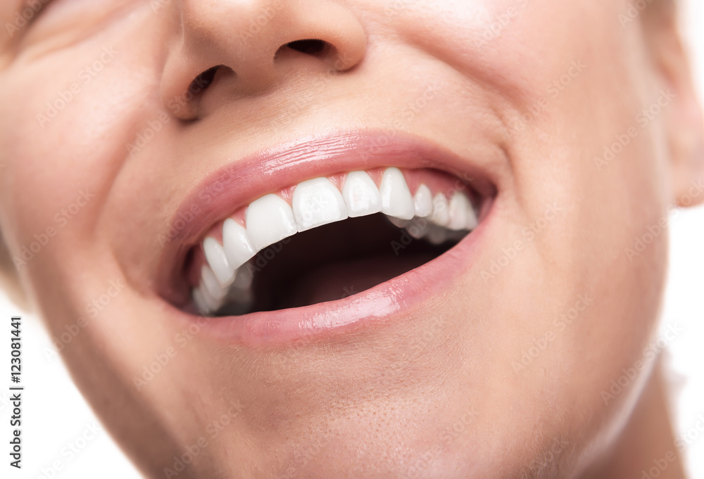 Obraz premium Beautiful wide smile of young woman.