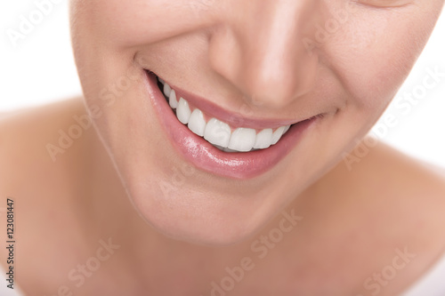 Beautiful wide smile of young woman.