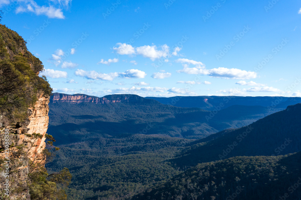 Blue mountains landscape along National Pass Track with eucalyptus forest and blue sky