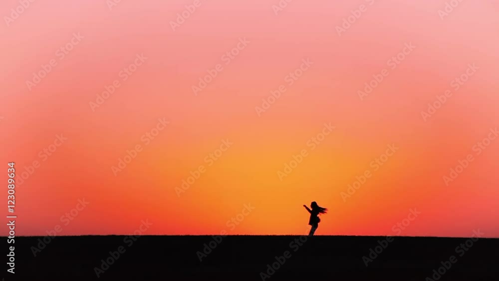 Girl runs to the horizon at sunset. Girl runs to the horizon at sunset.
