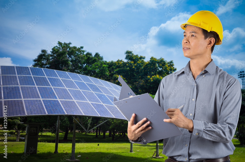Engineer holding yellow helmet Engineer holding yellow helmet