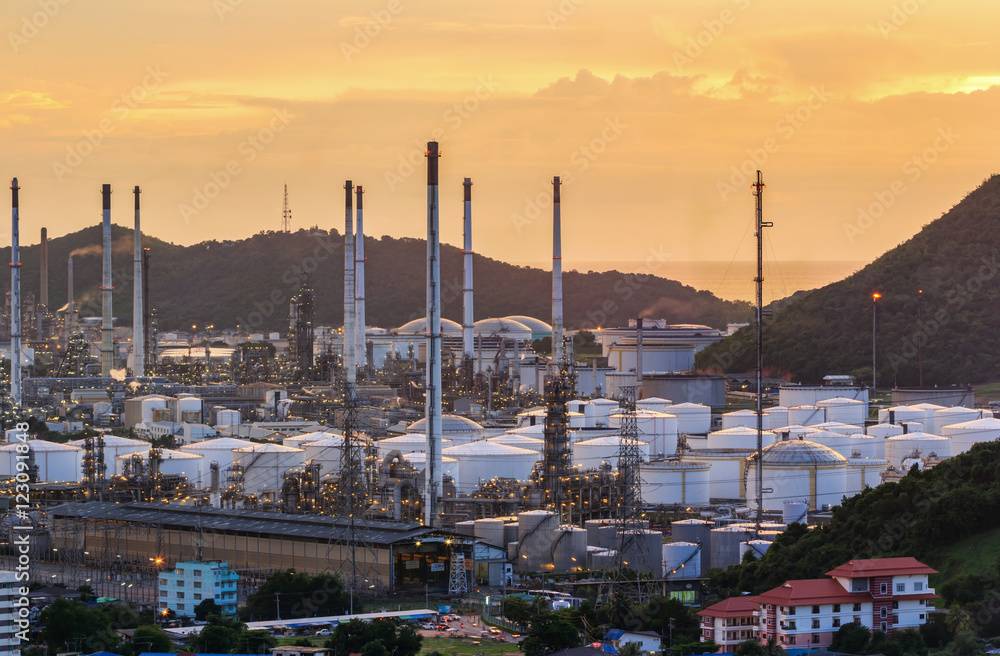 Soft focus of oil refinery plant in Thailand with sunset,Bokeh lighting