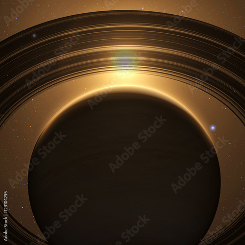 Fototapeta Naklejka Na Ścianę i Meble -  planet saturn with rings at sunrise on the space background 