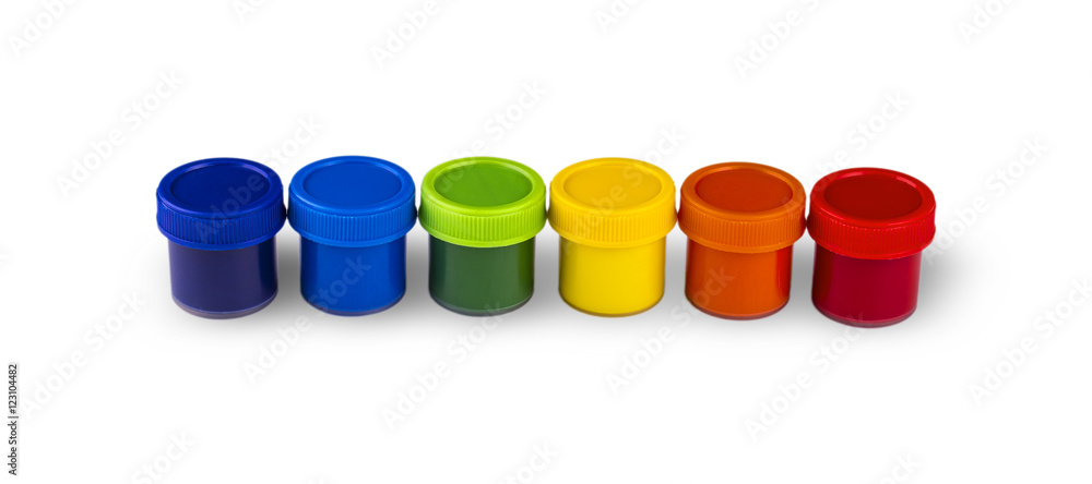 Children's paints in jars isolated on white Children's paints in jars isolated on white