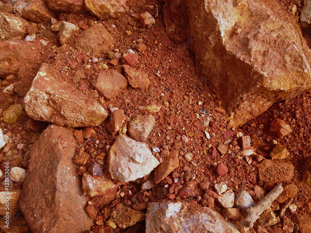 pile of brown-red rocks and stones pile of brown-red rocks and stones