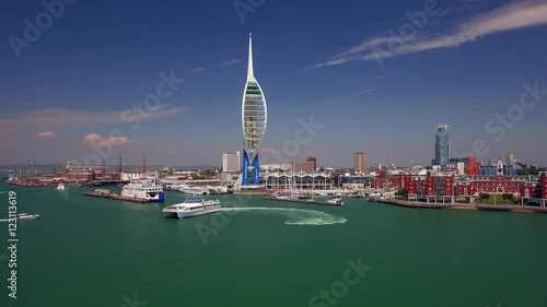 Portsmouth Harbour Showing Spinnaker Tower and Passenger Ferry photo