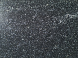 grainy black and grey granite floor