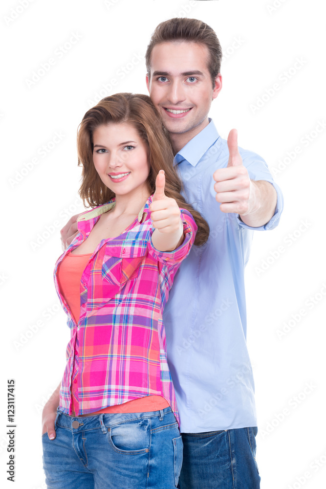 Happy couple with thumbs up sign. Happy couple with thumbs up sign.