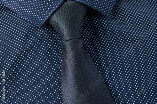 polka dots on a blue shirt. Elegance 