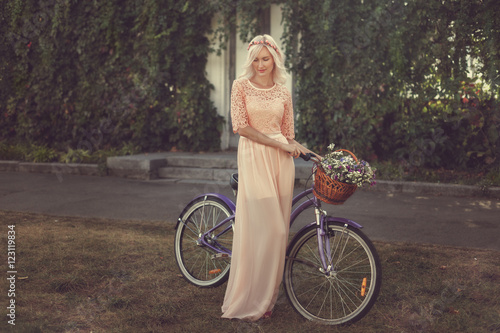 Modest girl in the pink dress.