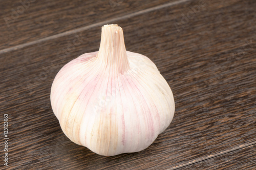 Garlic on wooden surface