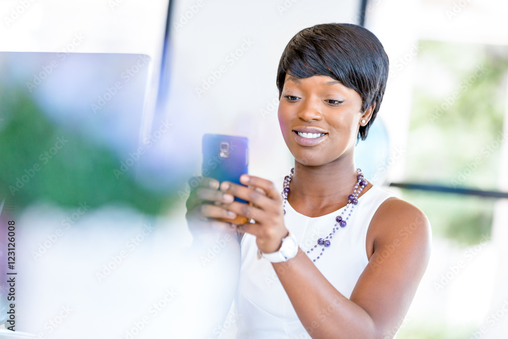 Portrait of smiling business woman with mobile Portrait of smiling business woman with mobile