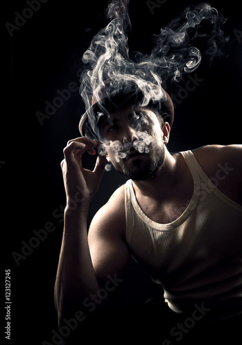 smoking gangster with gun