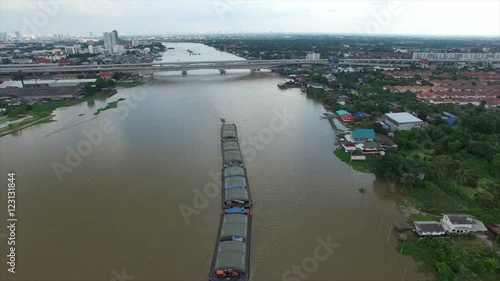 aerial view of bangkok city in the evening at the chaophaya river photo