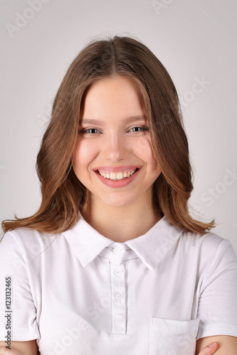 Girl in T-shirt. Close up. White background