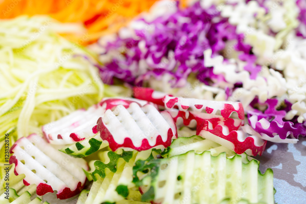 Different vegetables, grated on a grater shaped. Different vegetables, grated on a grater shaped.