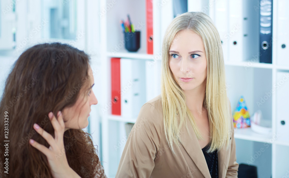 Business woman explains ideas to her female partner. Business and partnership, conference, job offer, financial success concept Business woman explains ideas to her female partner. Business and partnership, conference, job offer, financial success concept