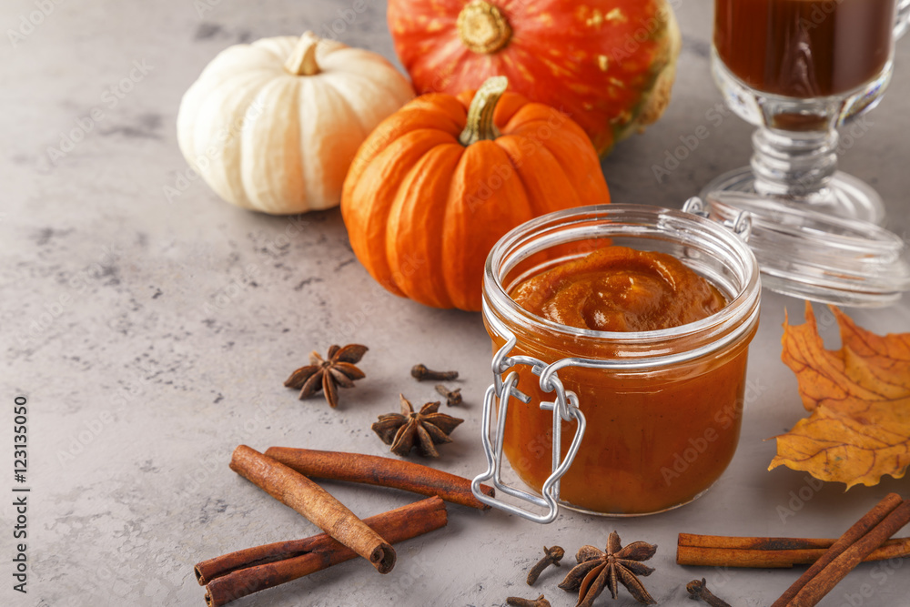 Pumpkin butter on concrete background. Pumpkin butter on concrete background.