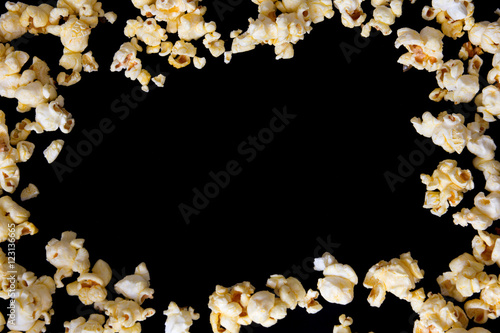 pop corn isolated on black with space for text