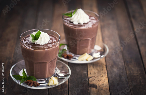 Chocolate pudding with whipped cream  photo