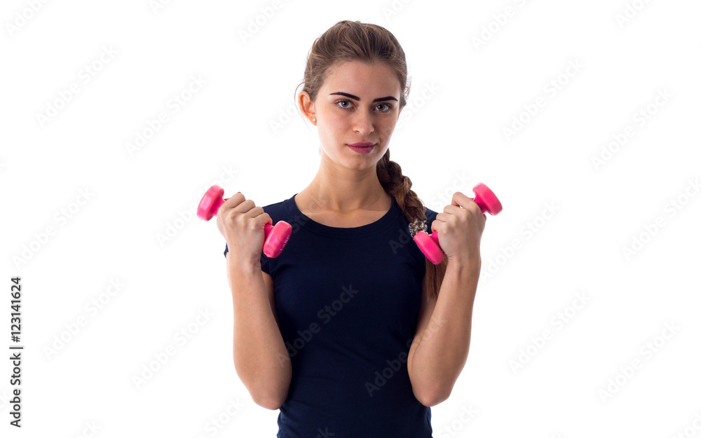 Woman holding two dumbbells Woman holding two dumbbells