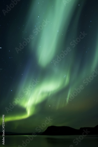 Aurora Borealis beautiful northern light in the clear night sky,  Iceland © whatafoto