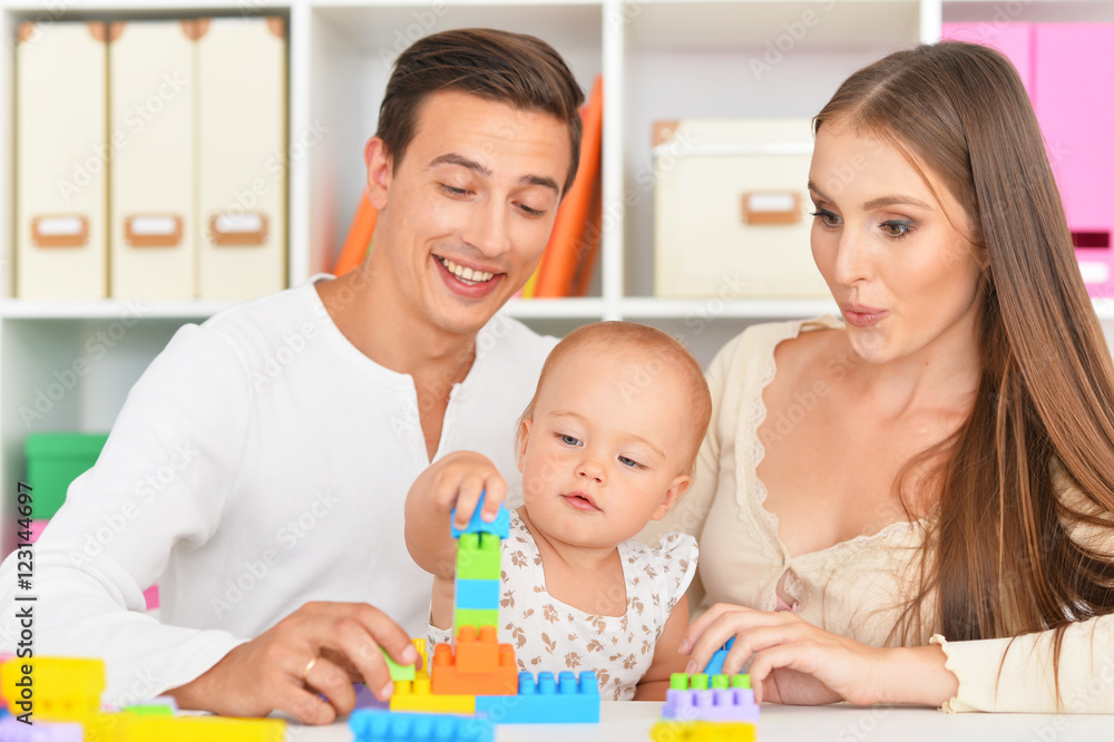 Happy family playing at home Happy family playing at home