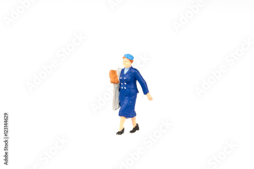 Miniature people business traveler on background with space for