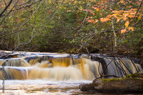 Northern Mn  stream with waterfalls  in fall.