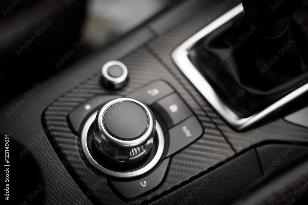 Detail of Multi function buttons and audio buttons in a modern car