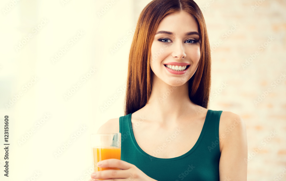 Happy smiling young woman drinking orange juice Happy smiling young woman drinking orange juice