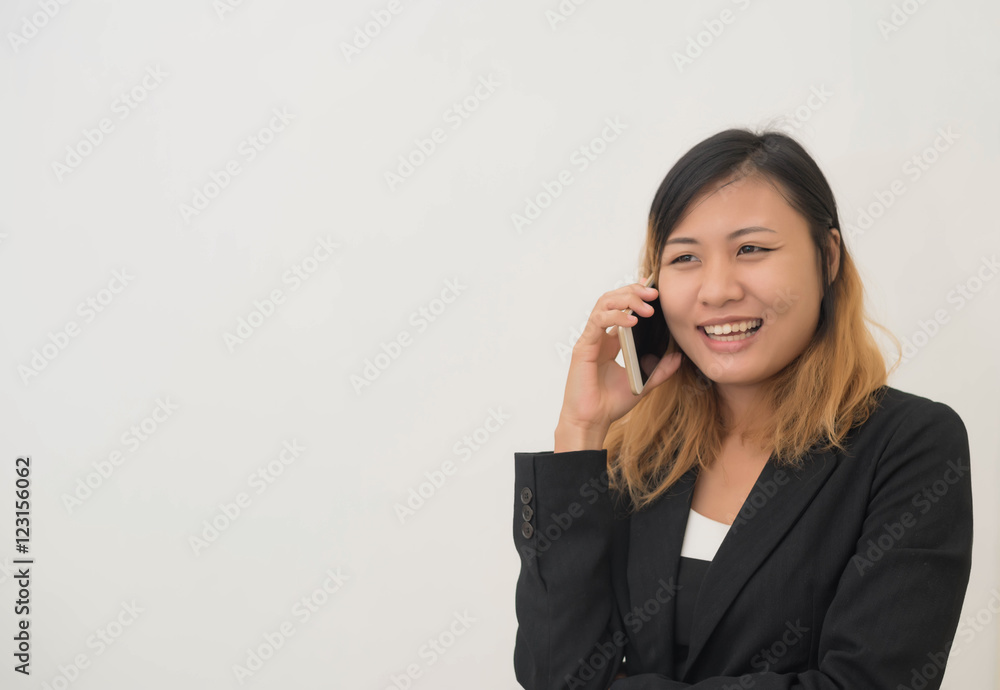 Businesswoman talking on mobile phone Businesswoman talking on mobile phone