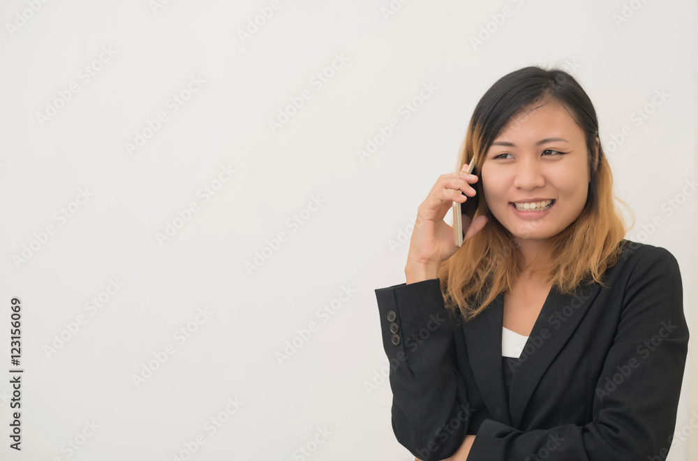 Businesswoman talking on mobile phone Businesswoman talking on mobile phone