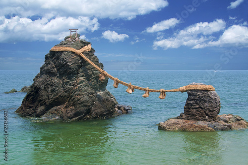 Sacred wedded rocks (meoto iwa) in Japan - famous landmark in the Mie prefecture photo