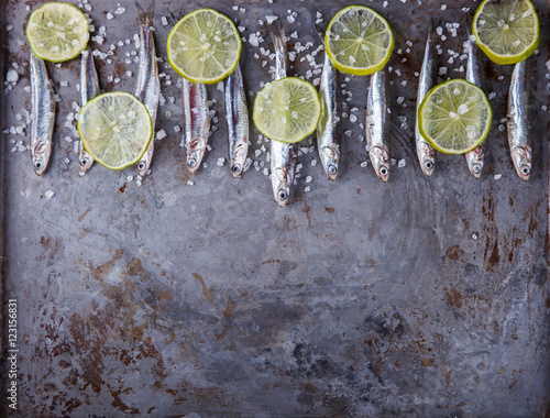 Valokuva Anchovy Fresh Marine Fish.Copy space.Appetizer. selective focus.
