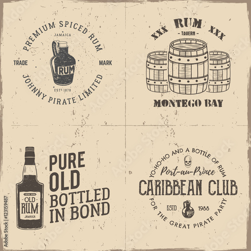 Set of vintage handcrafted pirates emblems, labels, logos. Isolated on a scratched paper background. Sketching filled style. Pirate and sea symbols - old rum bottles, barrels, skull. Vector