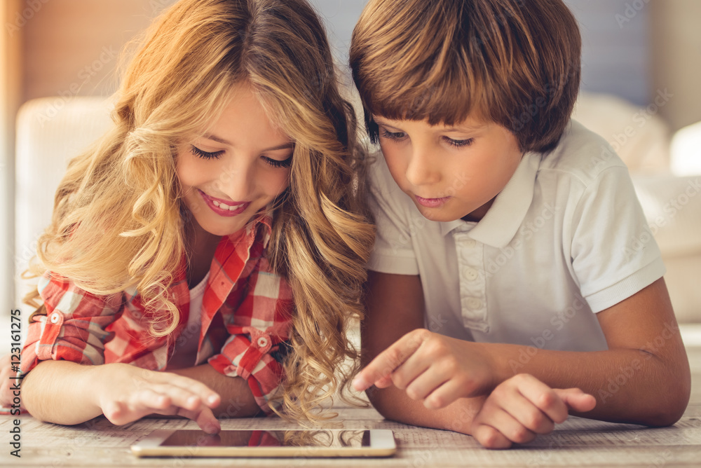 Fototapeta premium Little boy and girl