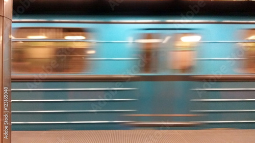 Subway train fast moving at metro station