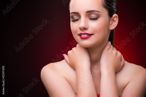Woman in beauty concept with red lipstick