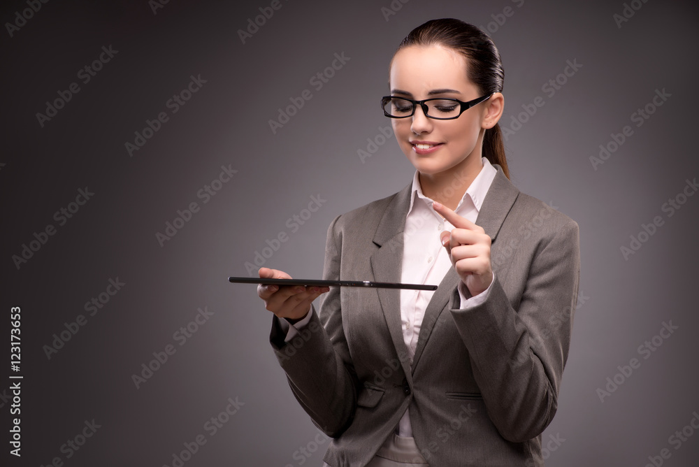 Young businesswoman working with tablet computer Young businesswoman working with tablet computer