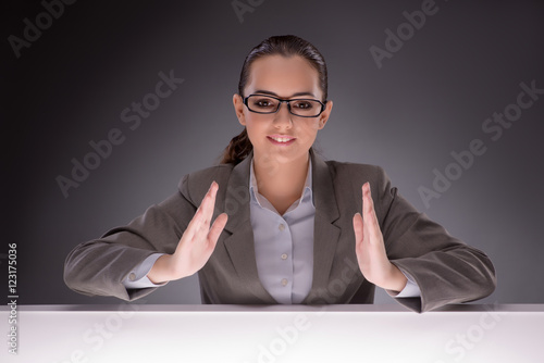 Young businesswoman working on the table