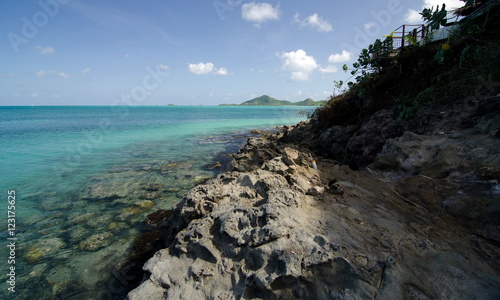 Beautiful  rocks, sands and waters of Cocobay beach - 3 photo